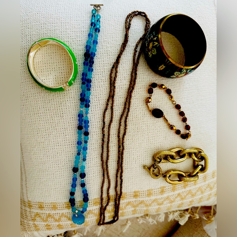 6 piece costume Jewelry set featuring 4 bracelets & 2 necklaces.